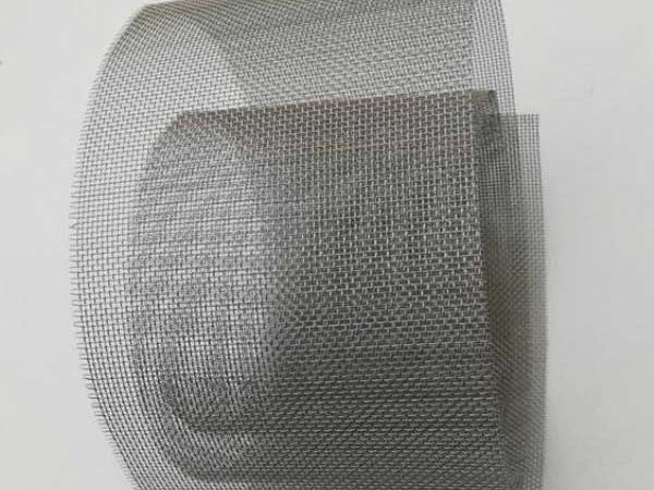 Woven mesh that has been cut into strips but not rolled